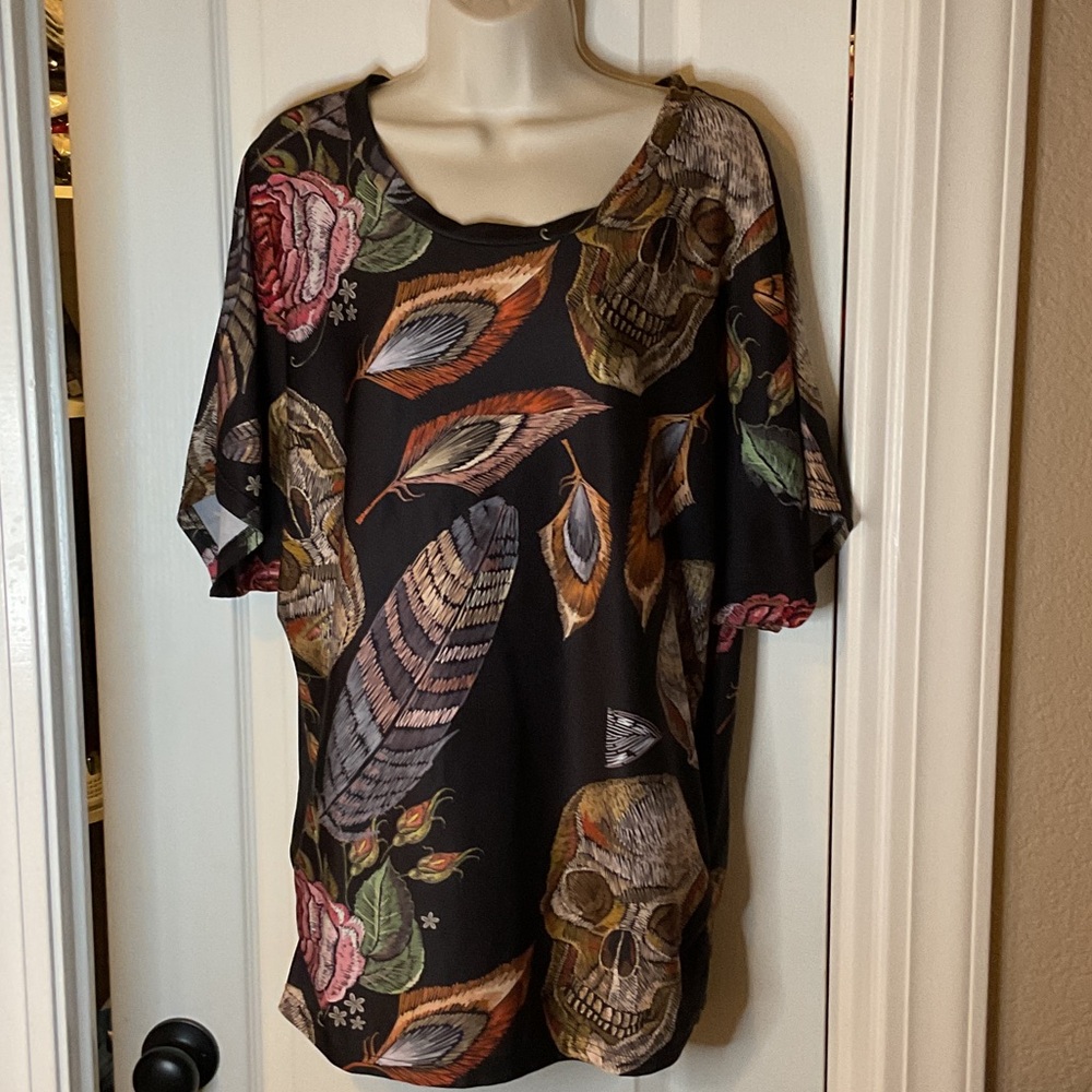 Edgy Black Top with Skull and Feather Design